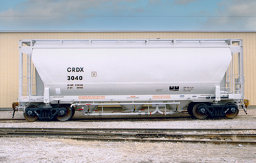 Pressure differential covered hopper cars